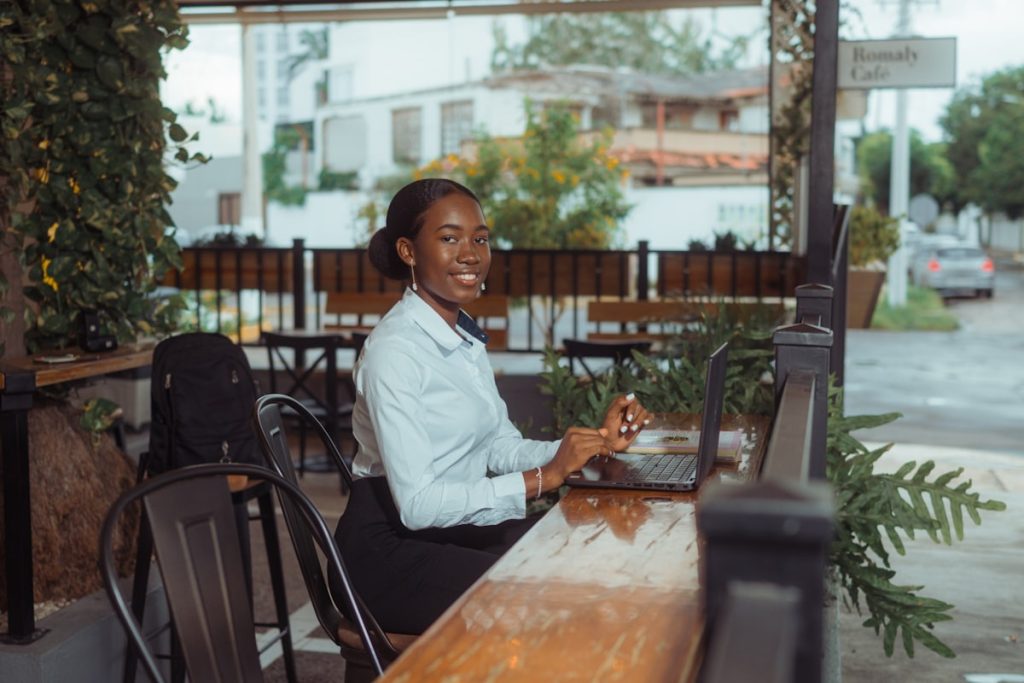 Hospitality owner learning how to respond to negative reviews on a laptop