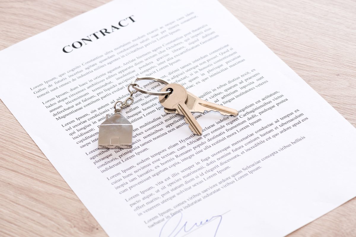 How much do Airbnb management companies charge, house keys on a signed management contract