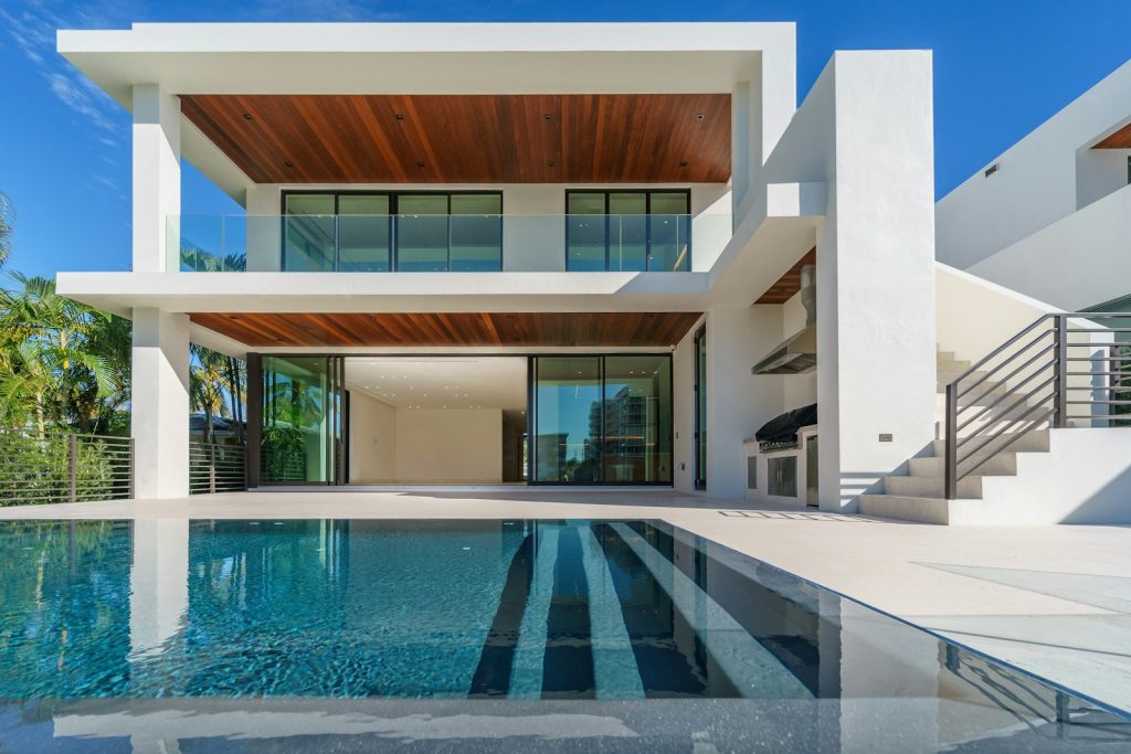 Luxury villa with a private pool, illustrating the Airbnb vs VRBO listing decision for villa owners