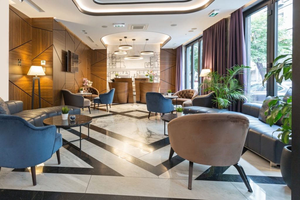 Hotel reception desk where guests increase direct bookings