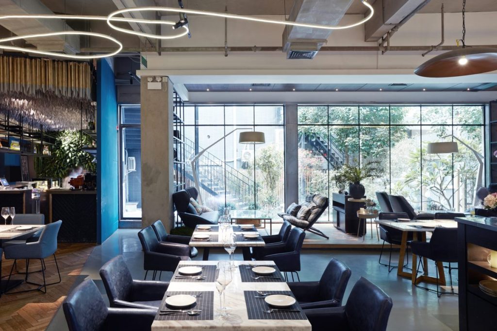 A warm restaurant interior that a restaurant marketing plan helps to fill