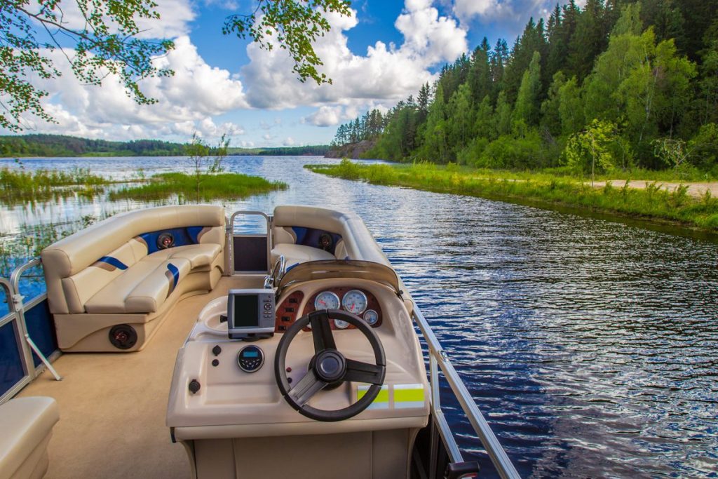 how to start a boat rental business pontoon rental boat helm and seating on a calm lake