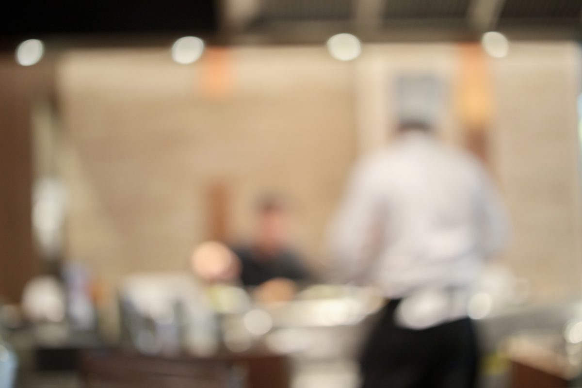 Chef working a busy line, the daily reality behind restaurant staff retention