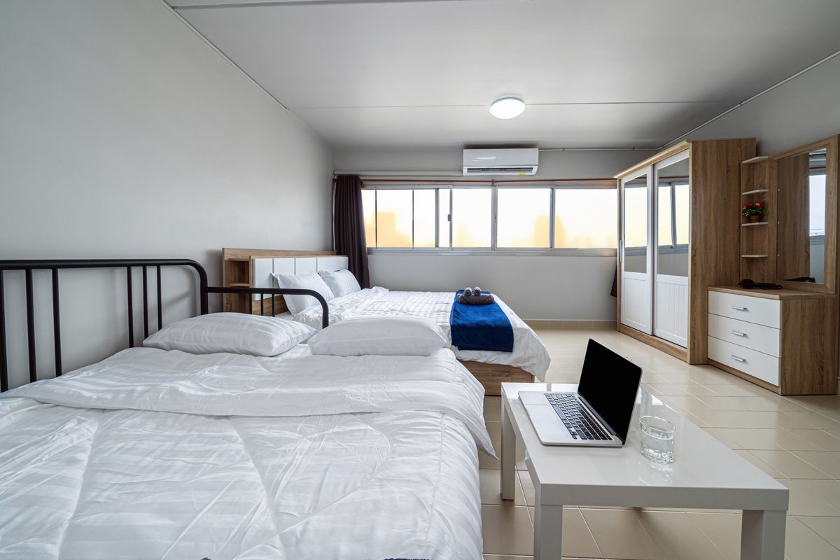 A flat, dim studio photo, a common reason an Airbnb is not getting bookings